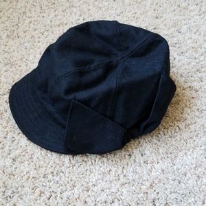 Floppy brim black hat.